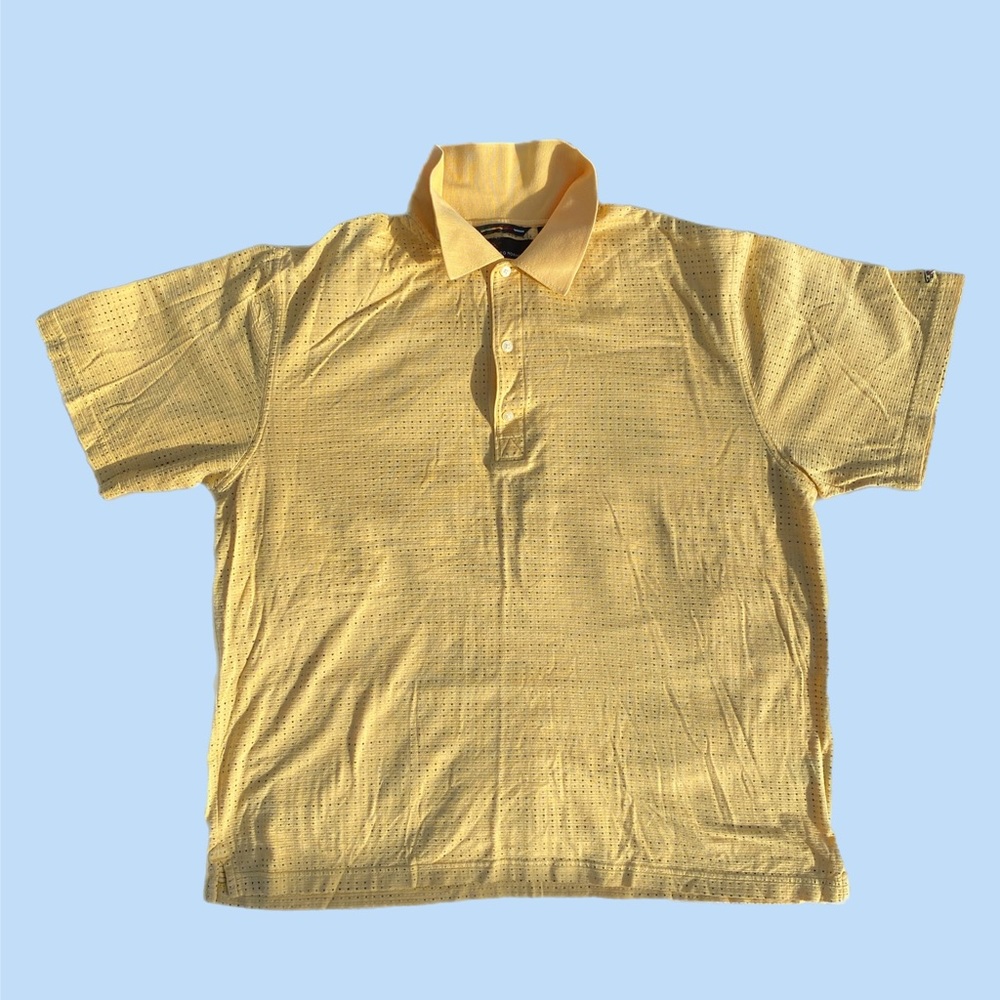 Greg Norman polo shirt.